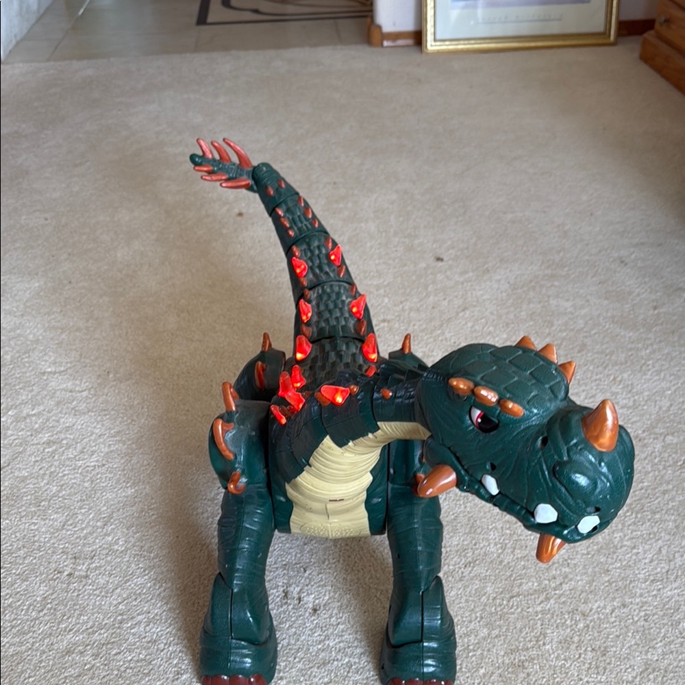 Green and Orange Dinosaur Toy